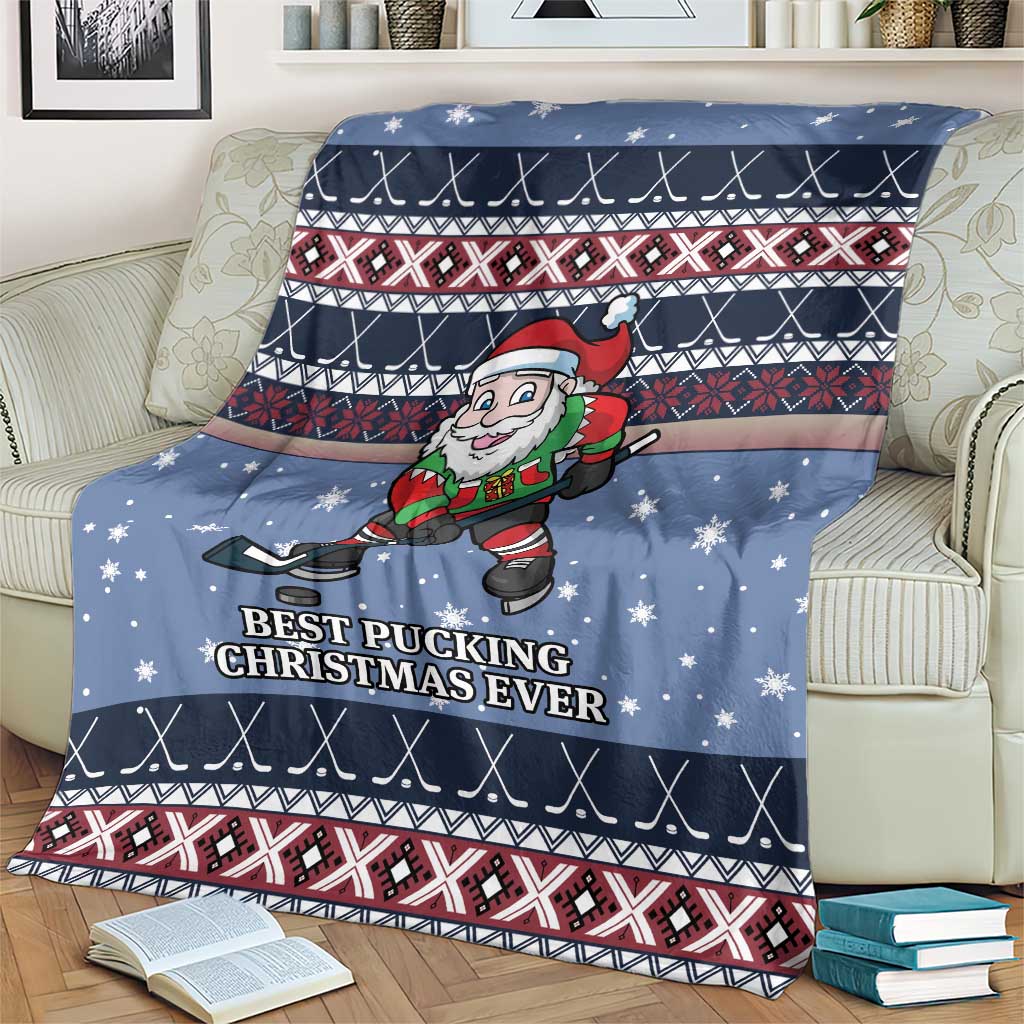 Blue Santa hockey blanket with festive patterns and “BEST PUCKING CHRISTMAS EVER” headline