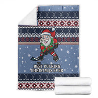 Blue blanket set with Santa hockey print, “BEST PUCKING CHRISTMAS EVER,” and folded white backing