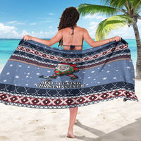 Blue Christmas hockey sarong with patterned borders and Santa holding a hockey stick