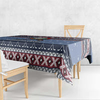 Navy blue Christmas tablecloth corner drape with red and white diamond pattern trim