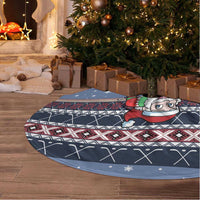 Blue round tree skirt with Santa hockey graphic, patterned border and white fringe