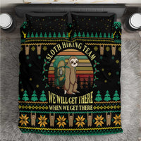 Black duvet cover with green, yellow, and brown sloth hiking holiday design and text
