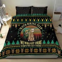 Black duvet on bed with sloth hiking graphic, arched doorway scene, and holiday border