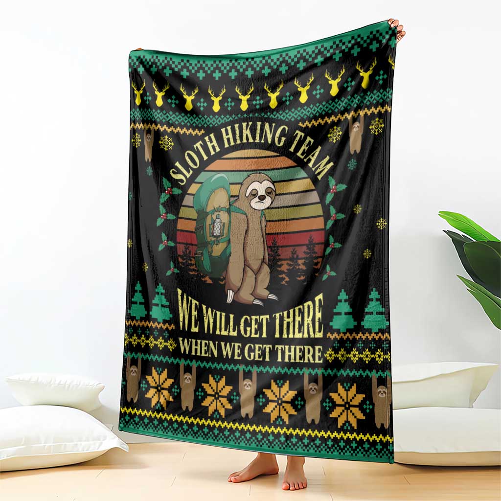 Sloth hiking team holiday blanket, black with green/yellow pattern border and sloth graphic