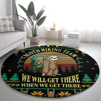 Round black sloth hiking team rug with sloth illustration, evergreen border, and “WE WILL GET THERE”