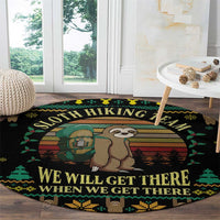 Round black sloth hiking team rug featuring sloth and backpack graphic with “WE WILL GET THERE”