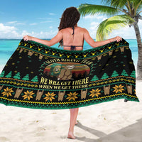 Black sloth-themed holiday sarong with green and yellow knit-style pattern