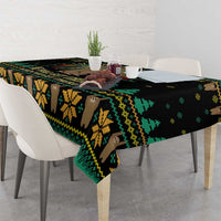 Black tablecloth with sloth and mountain hiking print in green and yellow