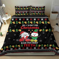 Black Christmas bedding set with large central text, cartoon faces, and patterned trim