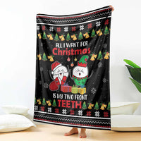 Black throw blanket with Christmas cartoon characters and “two front TEETH” lettering
