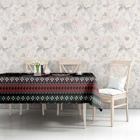 Black Christmas tablecloth on dining table with zigzag and snowflake motif, festive print