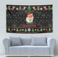 Black rectangular tapestry showing “Be Jolly with Hamster” and holiday patterned trim