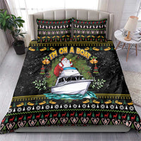 Black Santa-on-a-boat bedding set with multicolor holiday motifs and trim