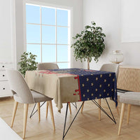 Fourth of July tablecloth on dining table, beige cloth with blue stars and red accents