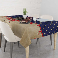 Fourth of July tablecloth on dining table, beige base with blue star border and red drips