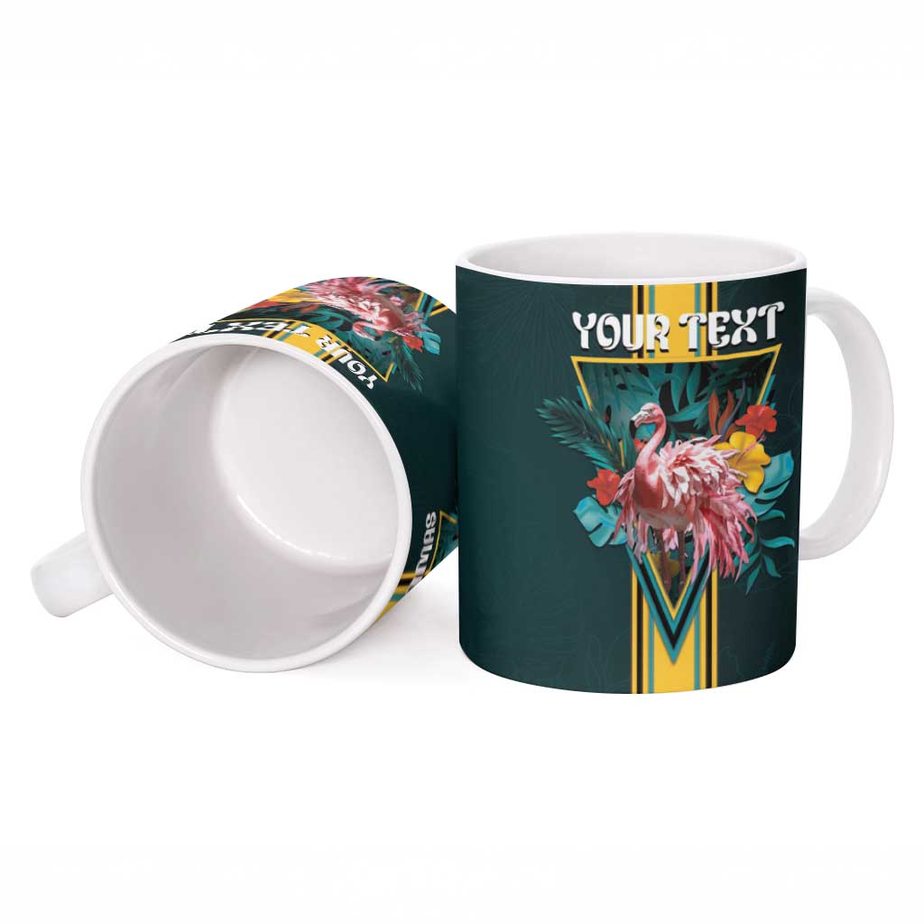 Dark teal ceramic mug with flamingo artwork, "YOUR TEXT" top, and open handle view