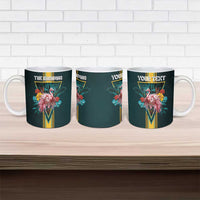 Three dark teal ceramic mugs with flamingo tropical flowers and gold M design