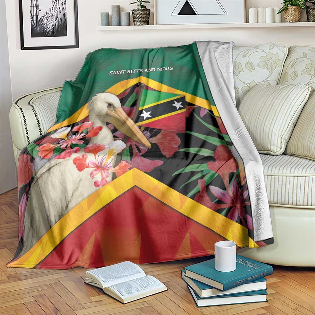 Green throw blanket with pelican, tropical flowers, and Saint Kitts and Nevis text