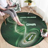 Green round rug with Virgin Islands in my DNA text, shown on wooden floor with person
