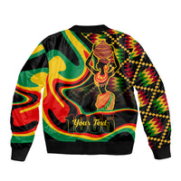 Black unisex bomber jacket with vibrant Juneteenth figure and flame print, ribbed hem
