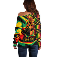 Women's off-shoulder sweater, black with colorful back graphic featuring candle, long sleeves