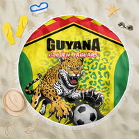 Yellow round beach blanket with fringe edge and Guyana Golden Jaguars jaguar football graphic