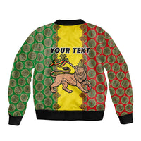 Zip-up bomber jacket, yellow back with 'YOUR TEXT' and lion print, green/red circular pattern