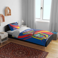 Ecuador flag bedding set on a bed, blue duvet with red/yellow design and crest and pillows