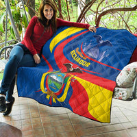 Ecuador flag quilt on patio couch, blue, yellow, and red colors with central crest