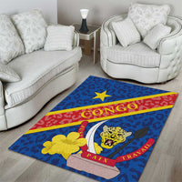 Blue area rug with leopard emblem, yellow star, and red CONGO PAIX TRAVAIL bands