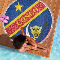Round beach blanket corner view with Congo DR coat of arms, leopard face, and fringe
