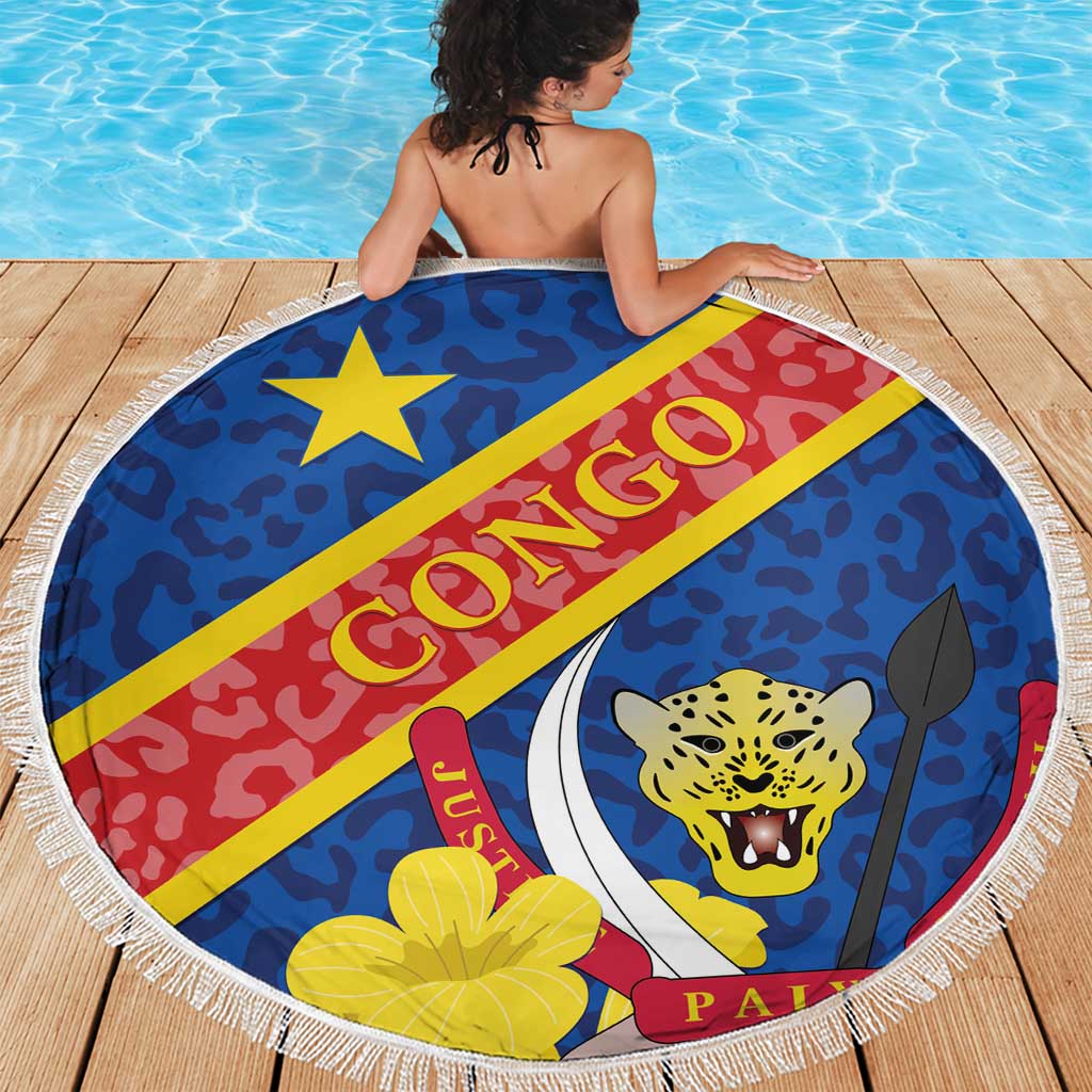 Round beach blanket with Congo DR flag stripes, leopard face graphic, and fringe trim