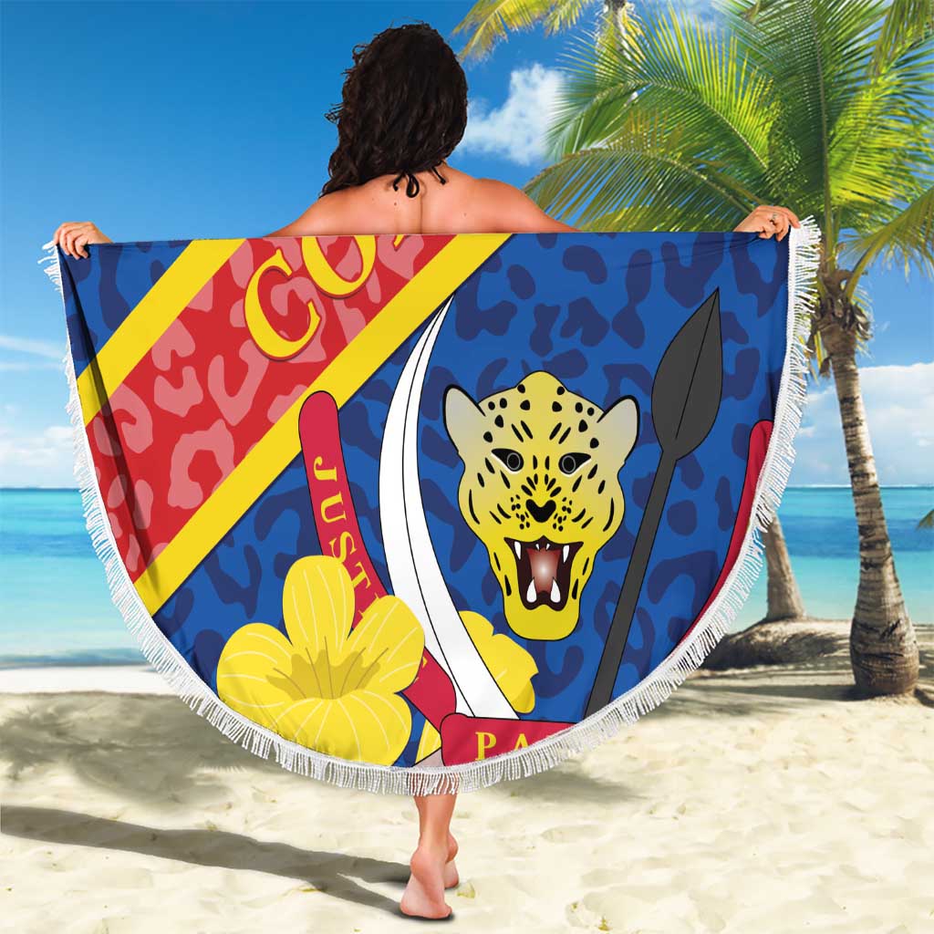 Round beach blanket held up, Congo DR leopard emblem with white fringe edge