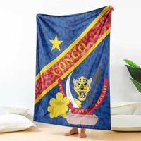 Blue blanket hanging display with yellow star, leopard head graphic, and red diagonal stripe