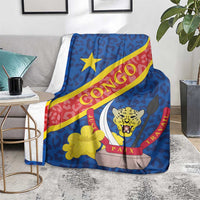 Blue coat-of-arms style blanket with leopard face, yellow star, red diagonal sash
