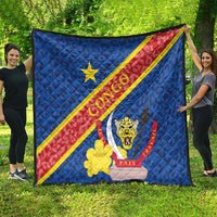 Blue quilted Congo flag blanket with leopard crest, yellow flower, and diagonal stripes.