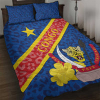 Blue quilt bed set with two pillows, leopard emblem on blue field and red-yellow diagonal stripe