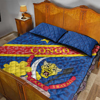 Blue quilt bed set with two pillows, leopard face graphic, tricolor sash and emblem