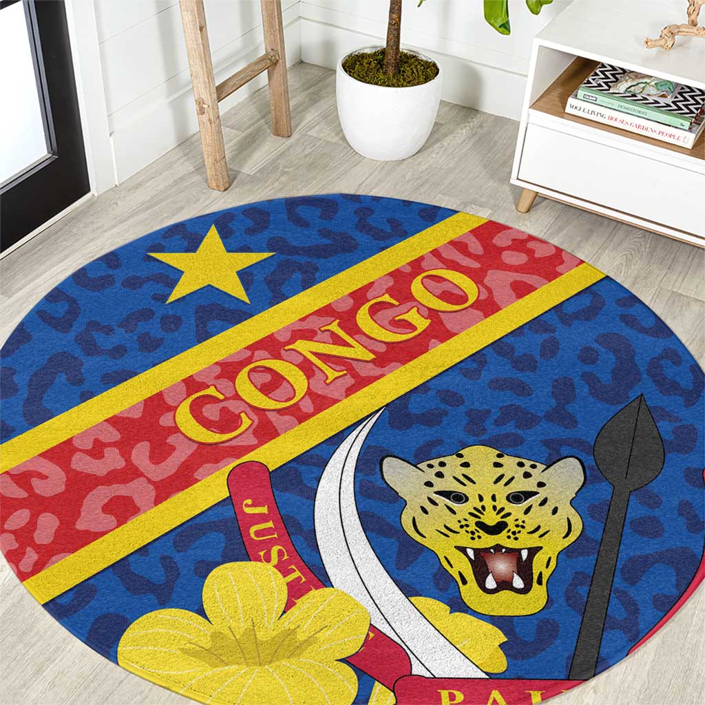 Blue round carpet with red and yellow band, leopard graphic and floral accents
