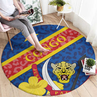 Blue round carpet with red/yellow stripe, leopard face graphic, star and floral motifs
