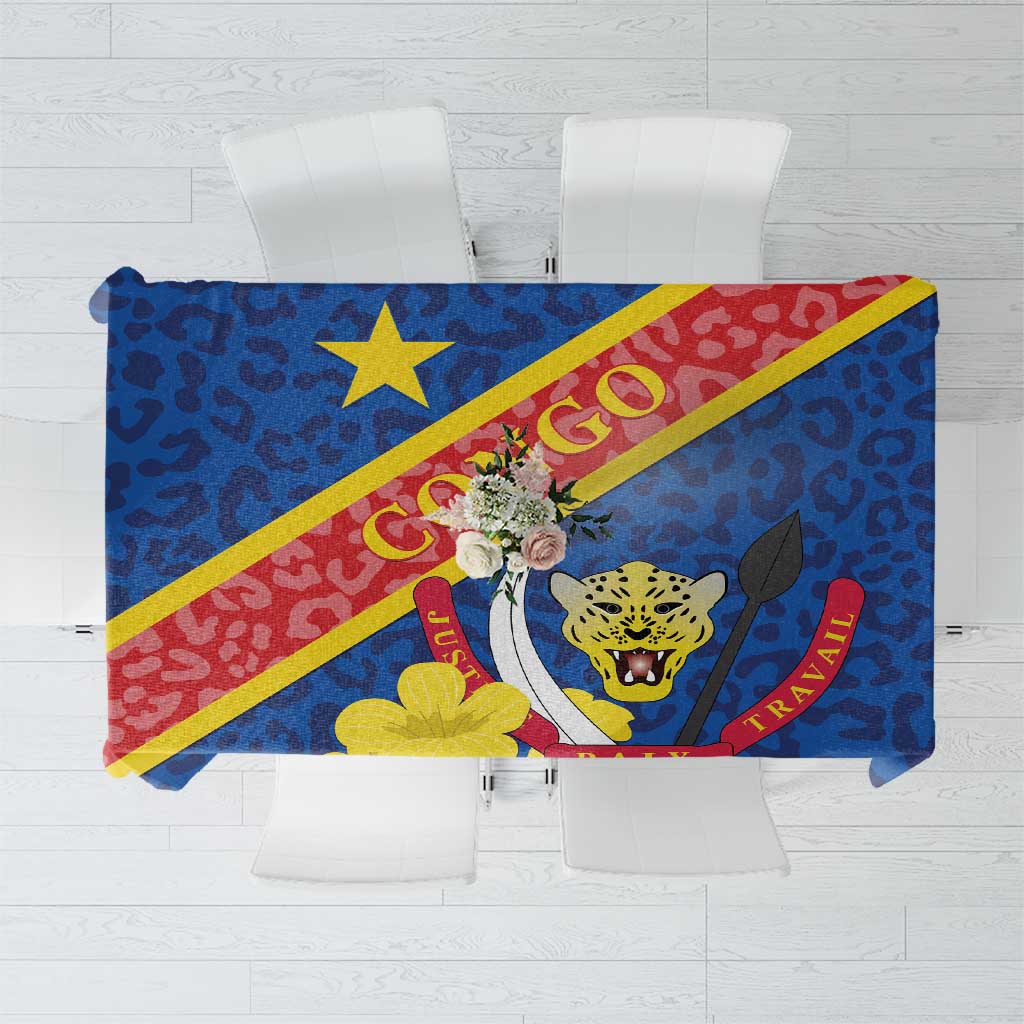 Blue tablecloth with coat of arms and leopard-style pattern graphic panels