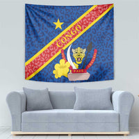 Congo DR tapestry with blue leopard pattern, diagonal red stripe, star and shield design