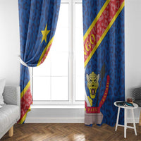 Blue window curtain panels with leopard emblem, yellow star, and red diagonal stripe