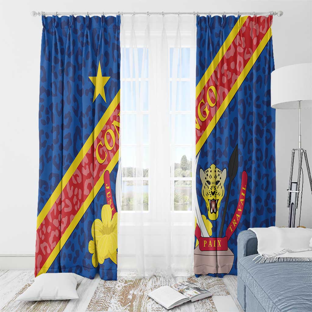 Blue window curtain panels with leopard emblem and Congo DR crest, yellow star and red stripe