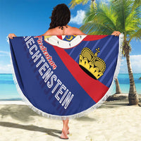 Round beach blanket held outdoors, Liechtenstein crest in blue and red with white fringe