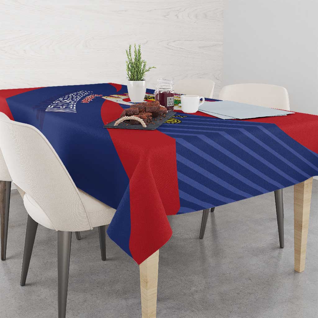 Blue and red dining tablecloth with coat of arms print and striped geometric pattern panels
