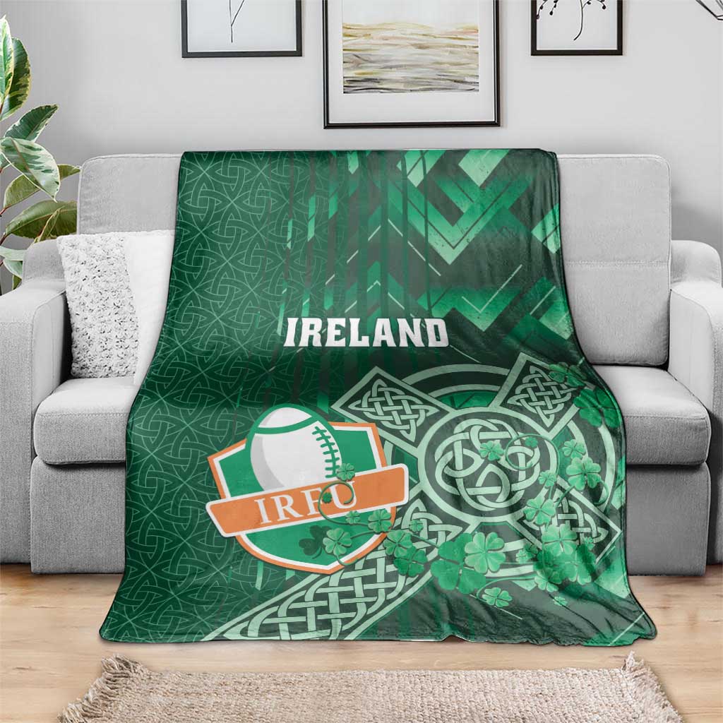 Green Ireland rugby blanket featuring Ireland text, Celtic cross and shamrock print