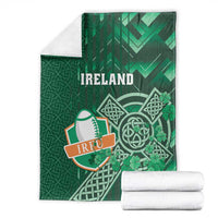 Green Ireland rugby blanket with Ireland text, Celtic cross and shamrock motif on background
