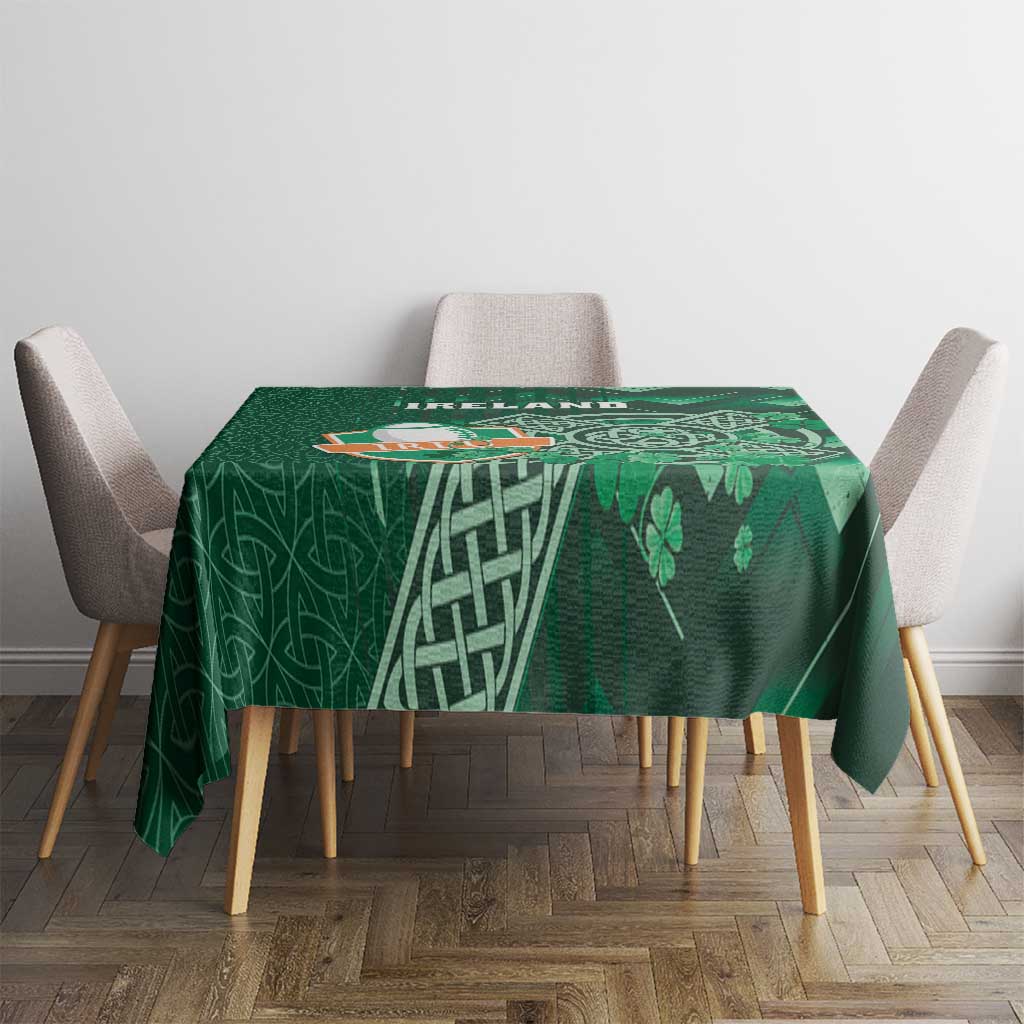 Green Celtic-themed tablecloth with shamrock and knot pattern, square drape