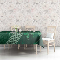Green tablecloth with Celtic cross, shamrock, and knot patterns